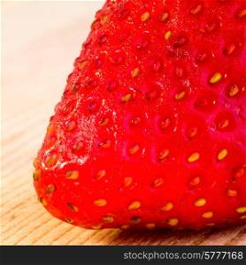 extreme close up of a strawberry.