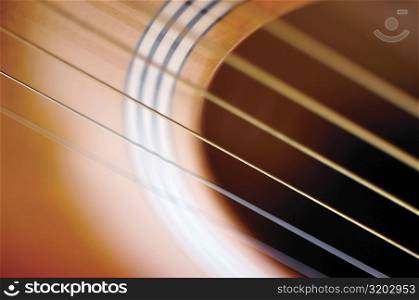 Extreme close-up of guitar and its strings