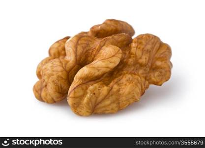 Extreme close-up of walnut seed isolated on white background