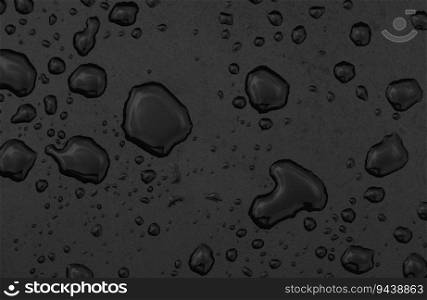 Extreme close up of water drops after rain on black surface background, high angle view, copy space