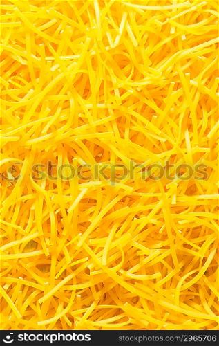 Extreme close up of yellow italian pasta