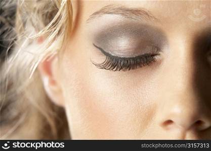 Extreme Close-Up Of Young Woman With Glamorous Make-Up