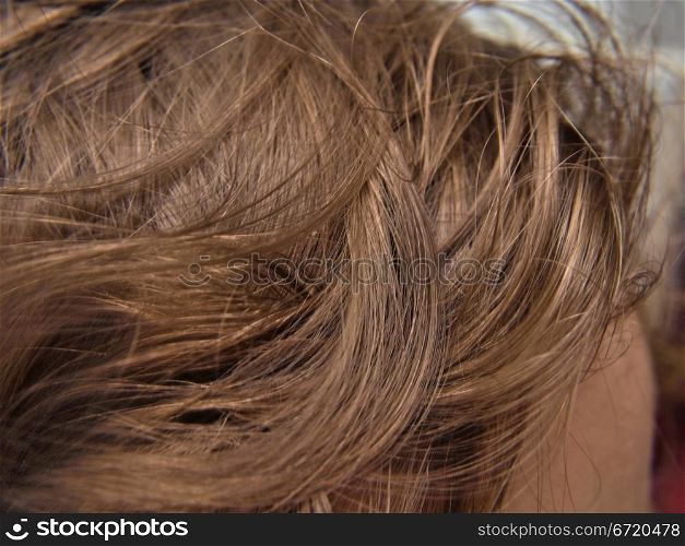 Extreme closeup of dark brown wavy hair