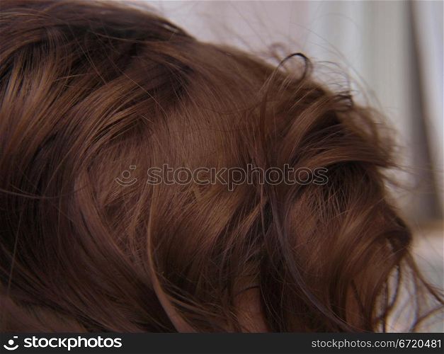 Extreme closeup of dark brown wavy hair