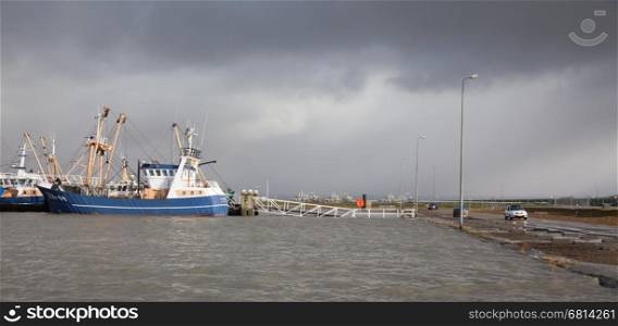 Extreme high tide at the dikes of the dutch coastal works