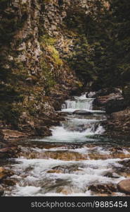 Exuberant water flowing in a stony stream on the plateau in Karadeniz