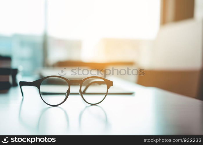 Eye Glasses on the study table education concept