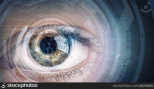 Eye scanning. Close up of human eye on digital technology background