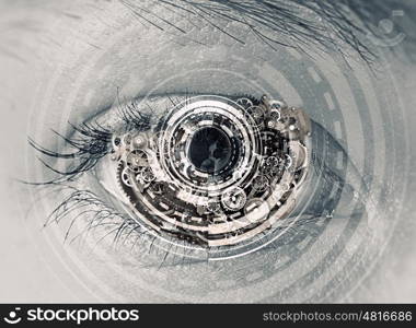 Eye scanning. Close up of human eye on digital technology background