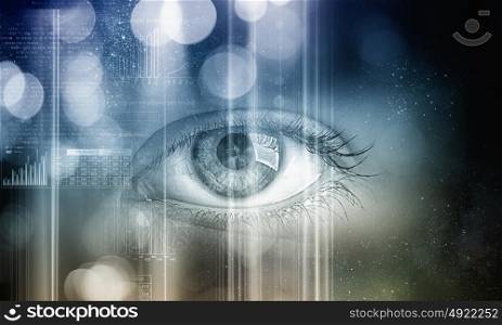 Eye scanning. Close up of human eye on digital technology background