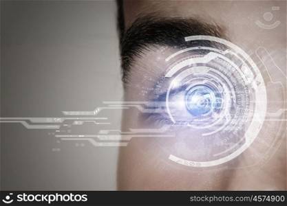 Eye scanning. Close up of man eye with digital icons