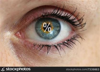 Eye with a percent sign in the pupil concept.. Eye with a percent sign in the pupil concept