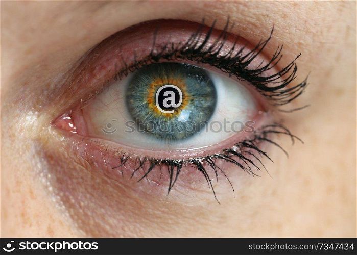 Eye with email sign in the pupil concept.. Eye with email sign in the pupil concept