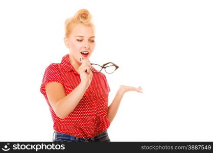 Eyewear. Fashion woman beautiful girl retro hairstyle holding new glasses looking surprised studio shot isolated on white