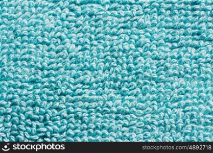 fabric and texture concept - close up of bath towel terrycloth or terry textile background. close up of bath towel terrycloth background