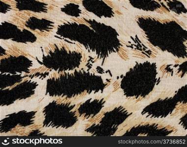 Fabric black and yellow background with leopard spots