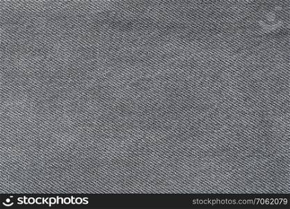 fabric pattern texture of denim or black jeans for the design abstract background.