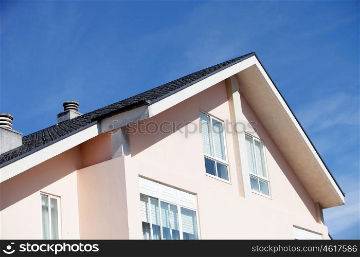 Facade of a beautiful house with a gabled roof tile black