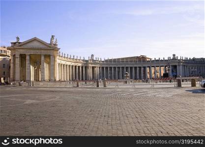 Facade of a building, Bernini&acute;s Colonnade, St. Peter&acute;s Square, Vatican, Rome, Italy