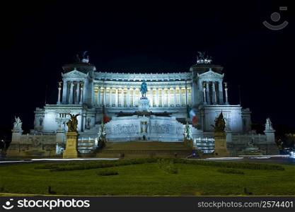 Facade of a building lit up at night, Vittorio Emanuele Monument, Piazza Venezia, Rome, Italy
