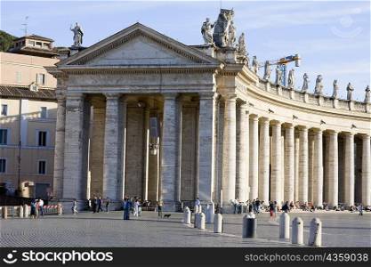 Facade of a church, Bernini&acute;s Colonnade, St. Peter&acute;s Square, Vatican City