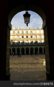 Facade of an arched gateway, Spain