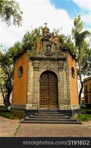 Facade of an octagonal chapel, Plaza De La Concepcion, Mexico City, Mexico