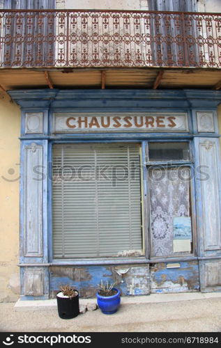 Facade of an old shoe shop in France