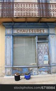 Facade of an old shoe shop in France