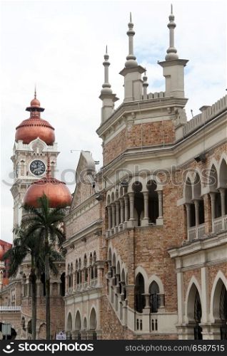 Facade of building with clock tower on the Merdeka square in Kuala Lumpur, Malaisya
