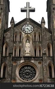 Facade of gray catholic french cathedral in Hanoi, Vietnam