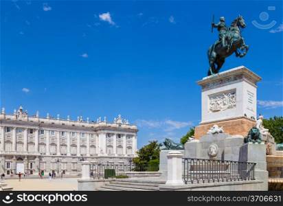 Facade of Madrid Royal Palace and Felipe IV Statue, Spain