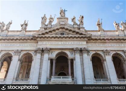 facade of Papal Archbasilica of St John in Lateran (Basilica di San Giovanni in Laterano) in Rome city