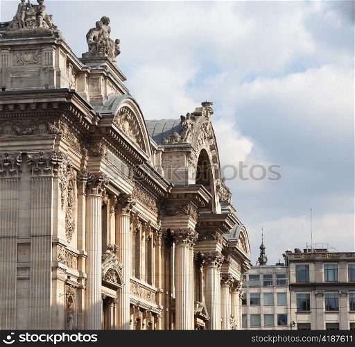 Facade of the Bourse in Brussels with the carved entrance arch