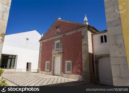 Facade of the Chapel of Our Lady of the Victory, adjacent to the former royal palace, inside the Citadel of Cascais, Portugal
