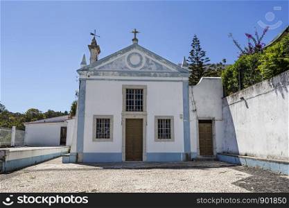Facade of the Church of Saint John the Baptist, built in the 18th century, in Queijas, Portugal