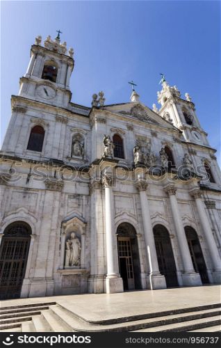 Facade of the late Baroque and Neo-Classical Royal Basilica and Convent of the Most Sacred Heart of Jesus, built in late 18th century in Lisbon, Portugal