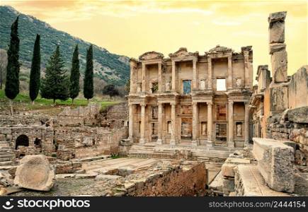 Facade of the Library of Celsus in Ephesus under the yellow sky. Turkey. Facade of Library of Celsus in Ephesus under yellow sky