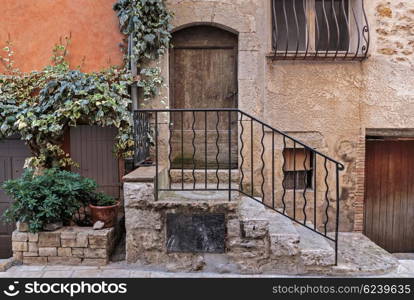 Facade of the old house in medieval village France