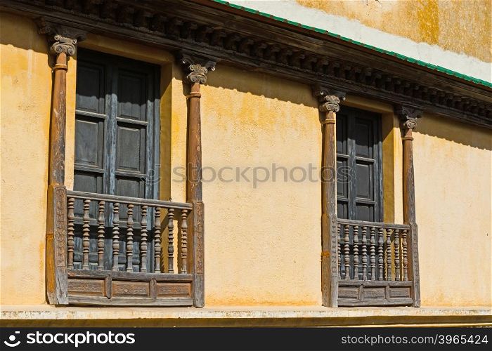 Facade of the Old Spain House with Wooden Balcony