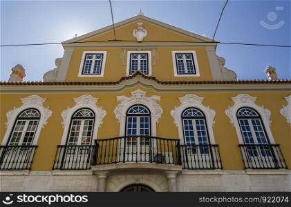 Facade of the Palace of the Count of Monte Real built in early 20th century in neo-Baroque and neo-Rococo architectural styles, in Lisbon, Portugal