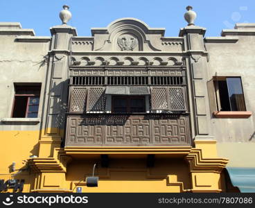 Facade with balcony on the street in Trujillo, north Peru