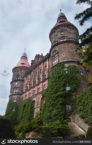 Facade with towers of castle Ksiaz in Walbrzych Poland