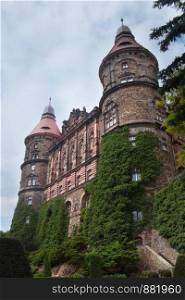 Facade with towers of castle Ksiaz in Walbrzych Poland