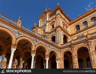 Facades of buildings on the Spanish square or the Plaza de Espana. Andalusia.. Seville. Spanish Square or Plaza de Espana.