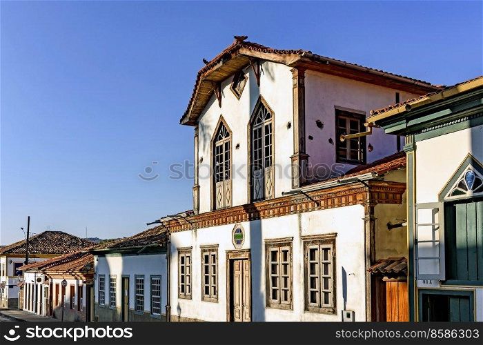 Facades of colonial sty≤streets and houses in the old and historic city of Diamantina in Minas Gerais, Brazil. Facades of colonial sty≤streets and houses in Dimantina city