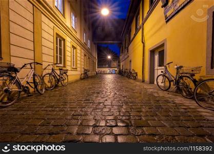 Facades of old houses in the historical part of the city at sunset. Bamberg. Bavaria Germany.. Bamberg. Old city street.