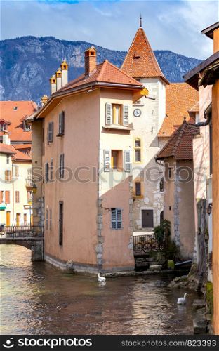 Facades of old medieval houses along the canal. Annecy France.. Annecy Old colorful houses in the historic part of the city.
