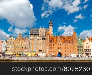 Facades of old medieval houses on the waterfront in Gdansk.. Gdansk. Central City Quay.