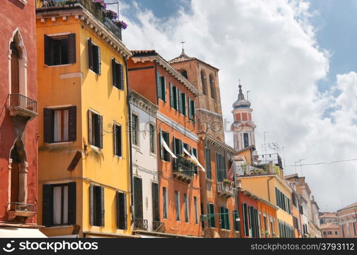 Facades of the houses on the street in Venice, Italy